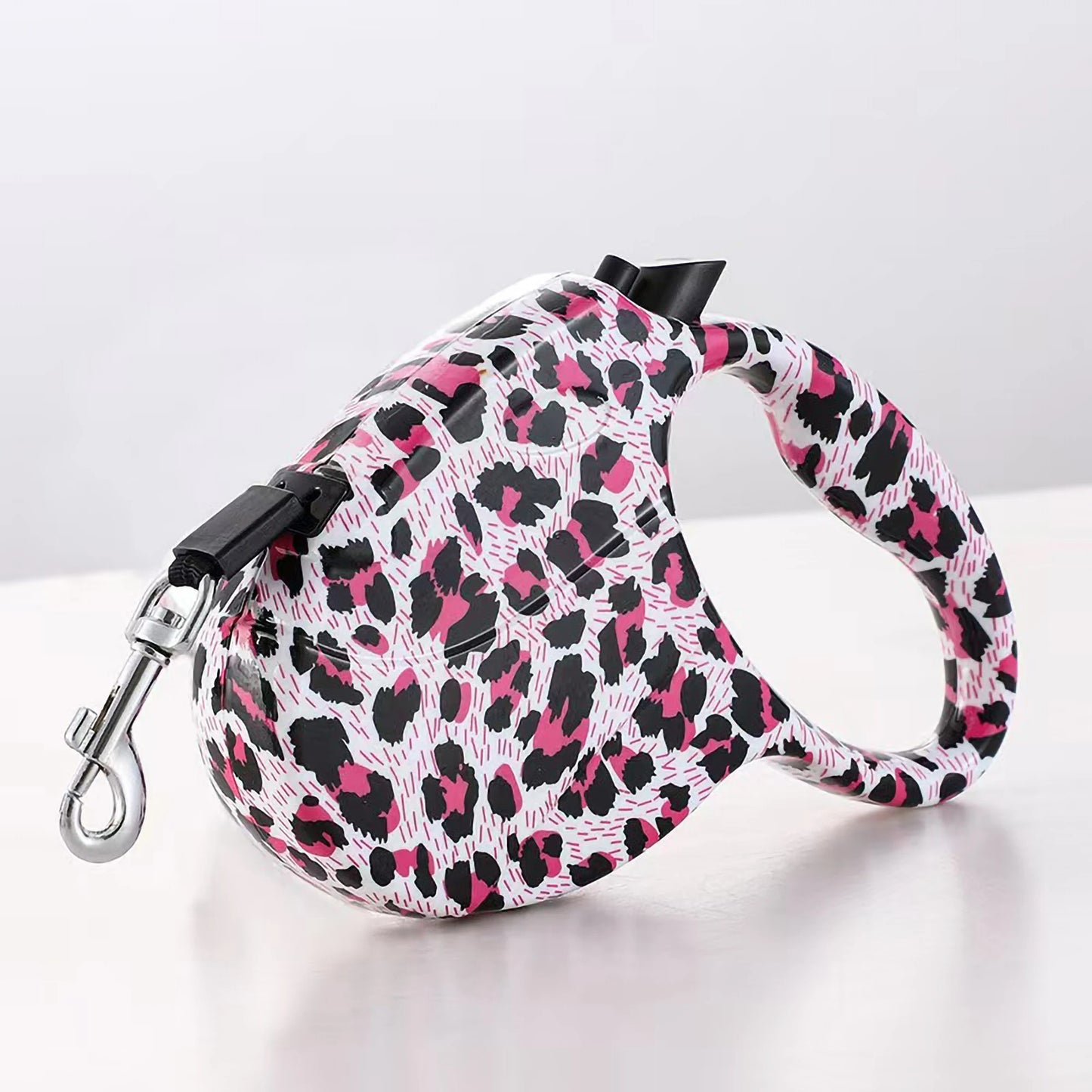 PawPrint AutoLeash: De automatische intrekbare hondenriem met stijl!