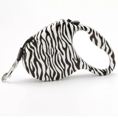 PawPrint AutoLeash: De automatische intrekbare hondenriem met stijl!